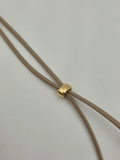 ADJUSTABLE CORD NECKLACE WITH FISH PENDANT